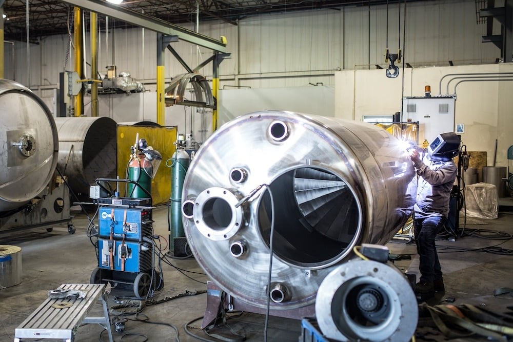 stainless steel mixing tank fabricated by a welder